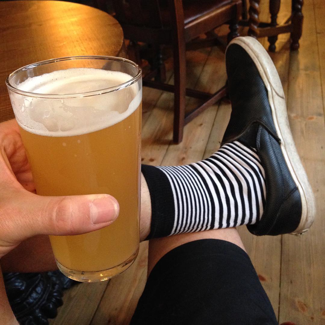 Hoppy beer, stripey socks.